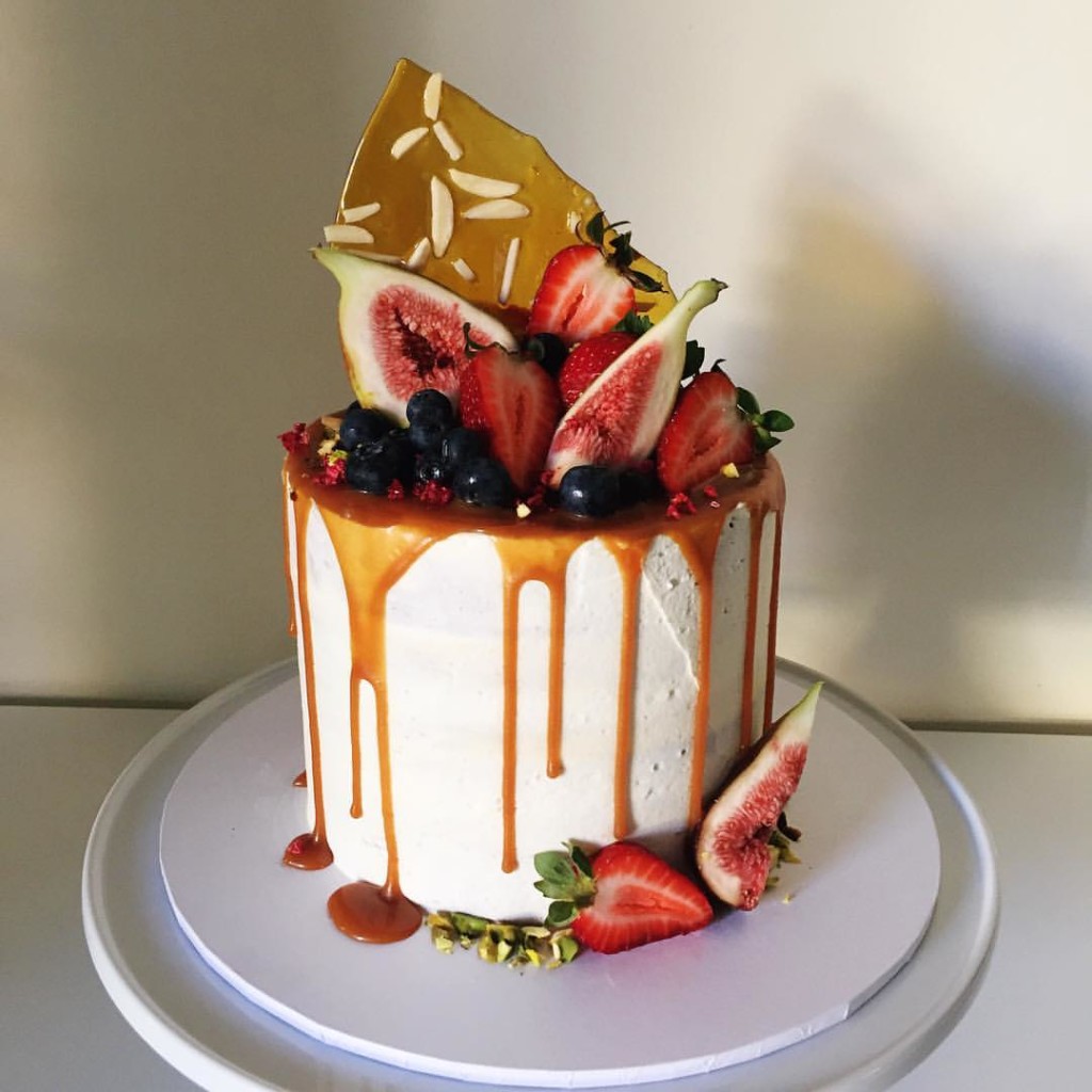 vanilla cake topped with caramel drip - 123WeddingCards