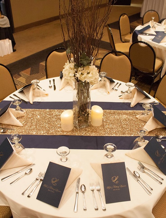 Burgundy table runner with golden table mats