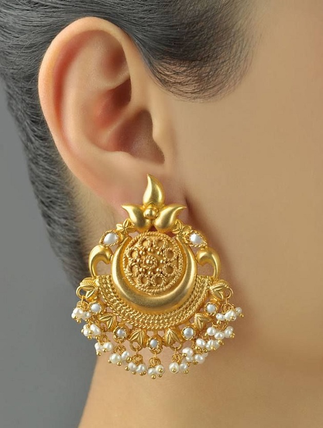 gold earrings on gorgeous bride