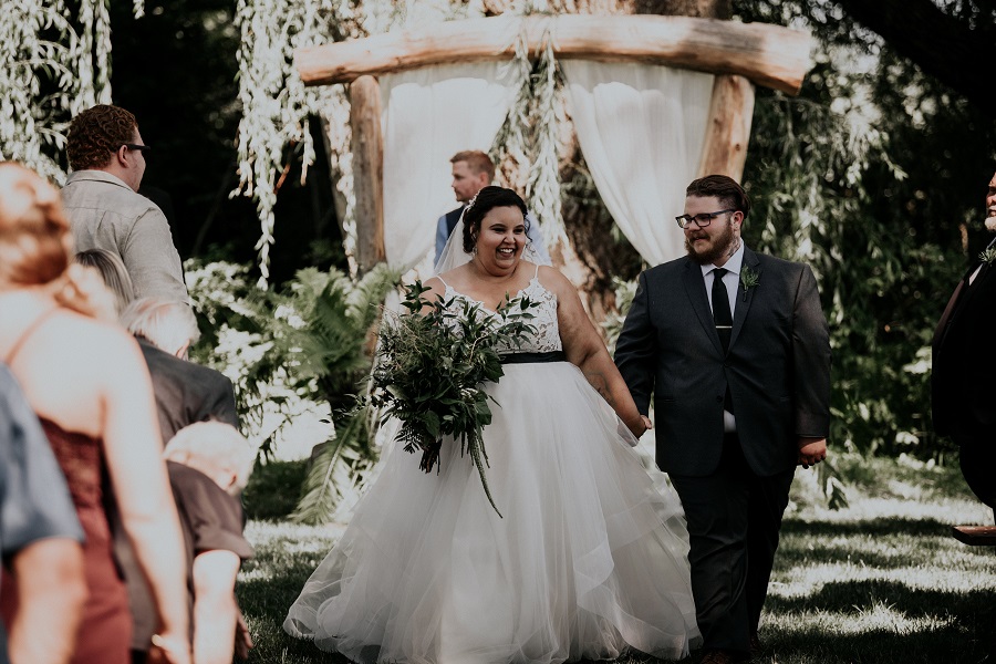 Courtney McMillion walked the aisle in her Jurassic Park theme